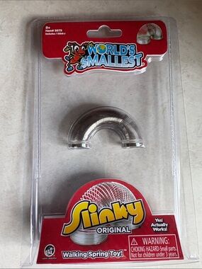 BNIB World's Smallest Slinky (really works)